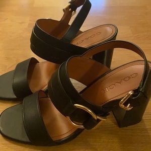 Black and gold coach heels